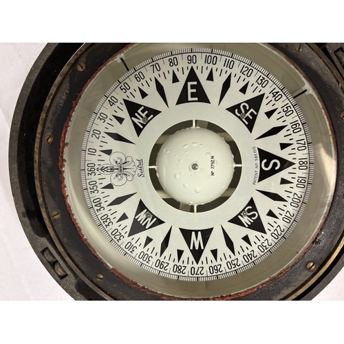 90 - Heavy antique brass case compass on swivel by Henry Browne & Son together with a pressure gauge and ... 
