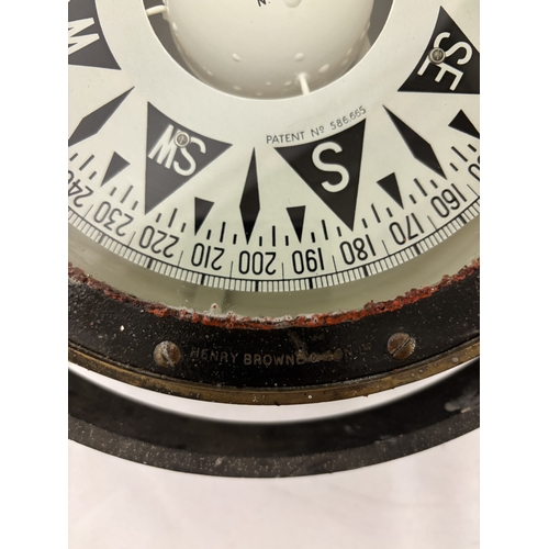 90 - Heavy antique brass case compass on swivel by Henry Browne & Son together with a pressure gauge and ... 