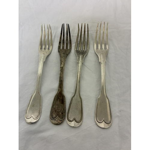 Four English silver table forks, London, 10 troy ozs.