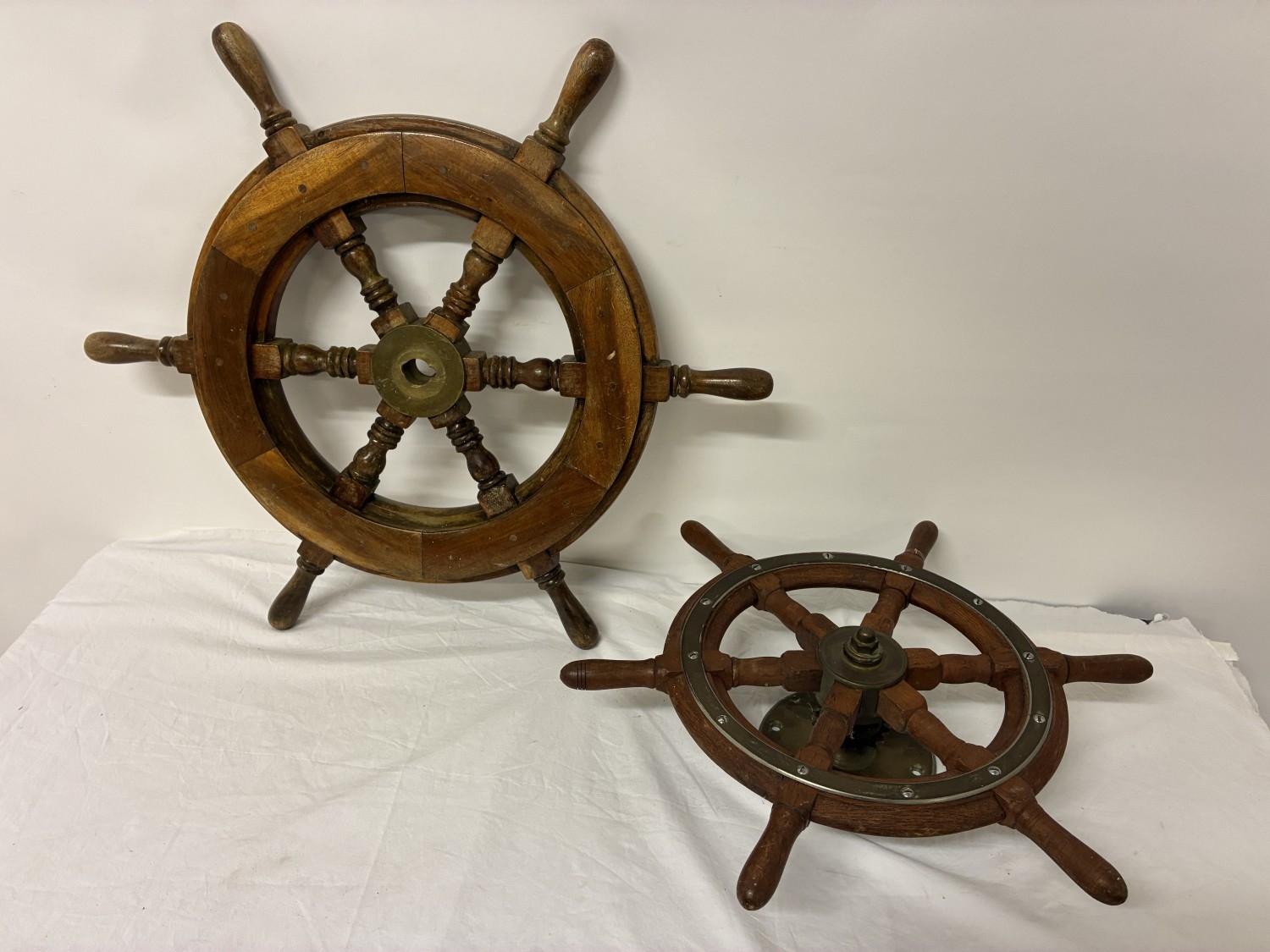Two ships wheels.