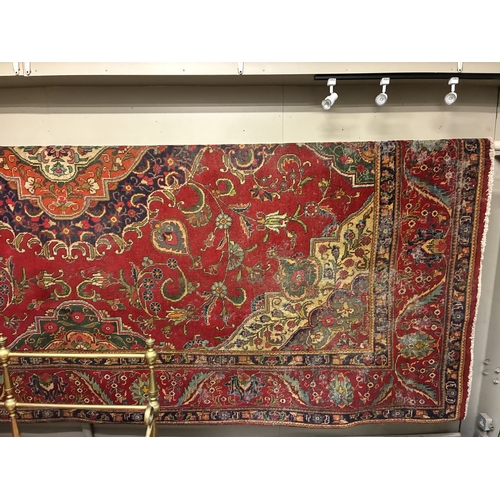 A large old drawing room rug. 397cm x 300cm approx. AF