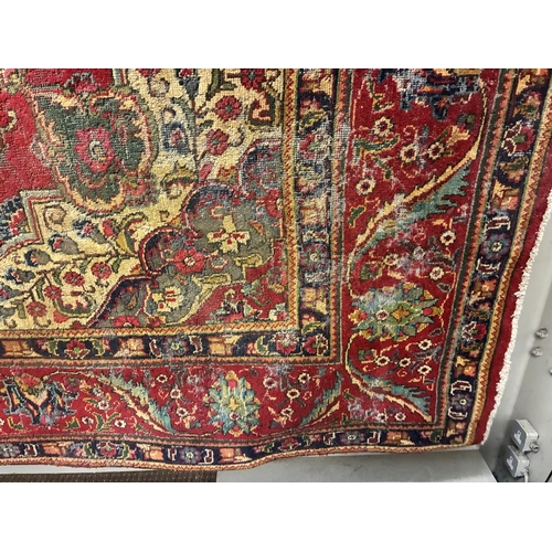 A large old drawing room rug. 397cm x 300cm approx. AF