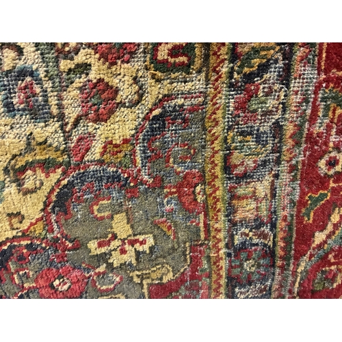 A large old drawing room rug. 397cm x 300cm approx. AF