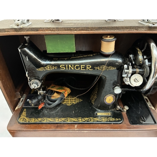 Singer sewing machine, nicely cased.