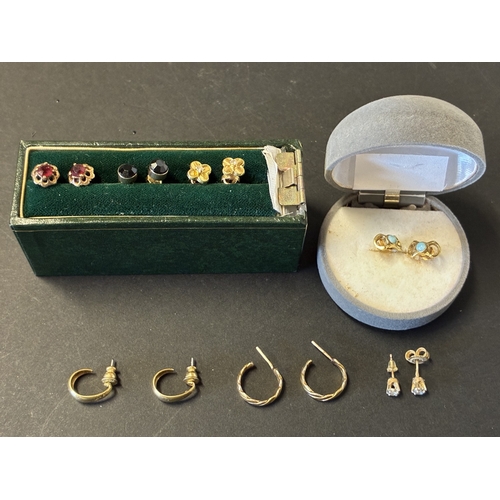 Collection of 7 pairs of gold earrings.