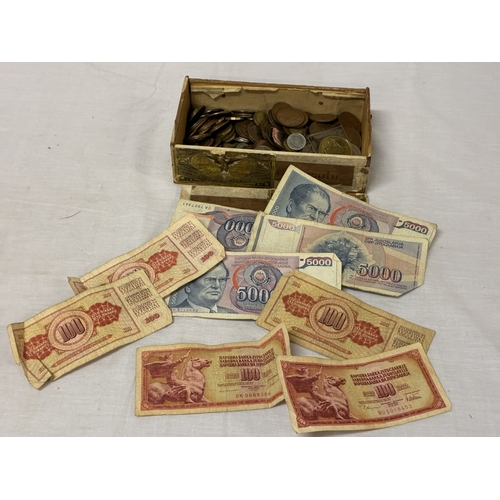 Box of coins & foreign bank notes.