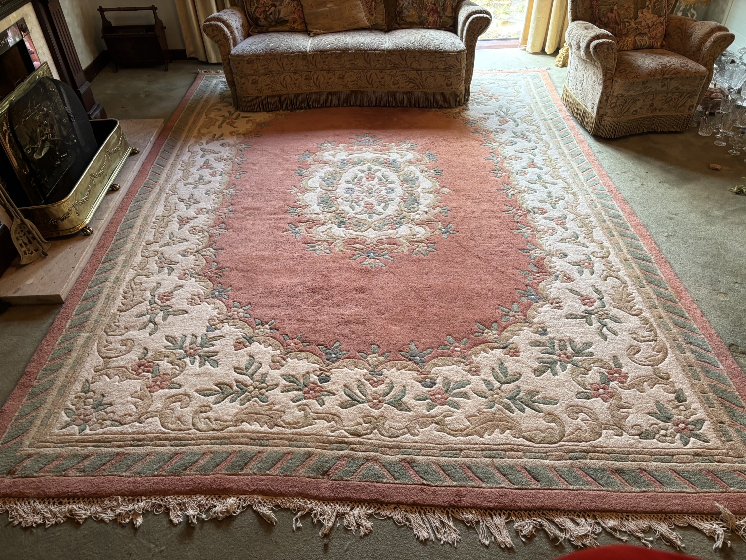 A large heavy drawing room rug. 397cm x 300cm approx