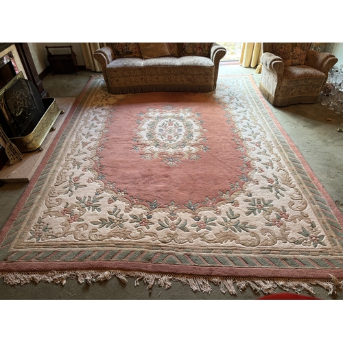 A large heavy drawing room rug. 397cm x 300cm approx