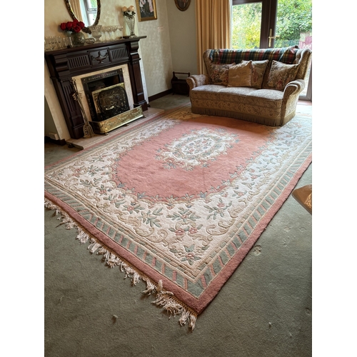 A large heavy drawing room rug. 397cm x 300cm approx