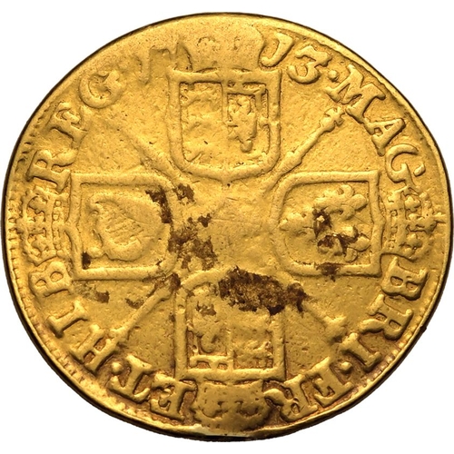 18 - Very Good | GREAT BRITAIN. Anne, 1702-14. Gold Guinea, 1713. London. Third draped bust of Queen Anne... 