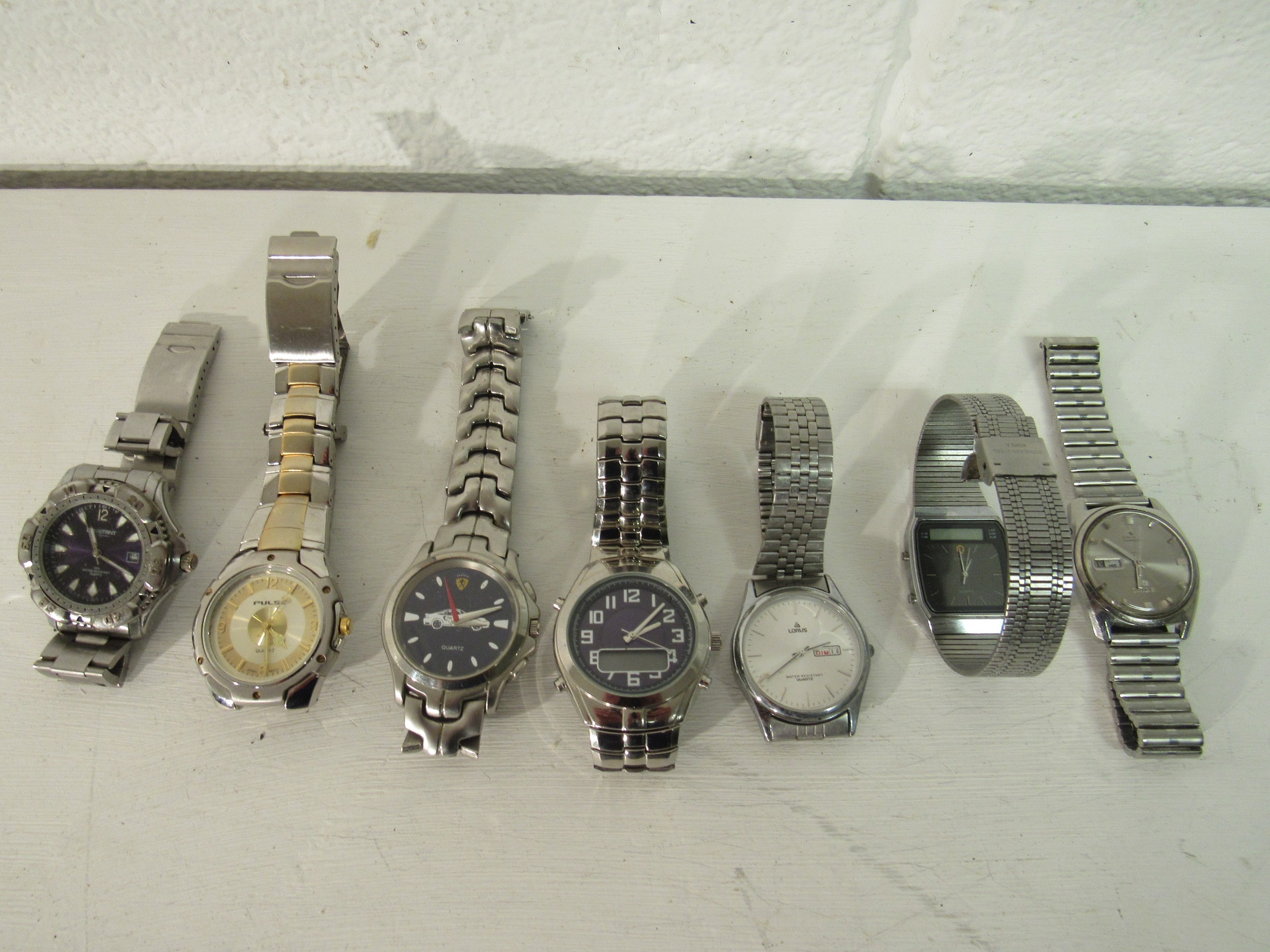 Seven assorted Gent's wrist watches.