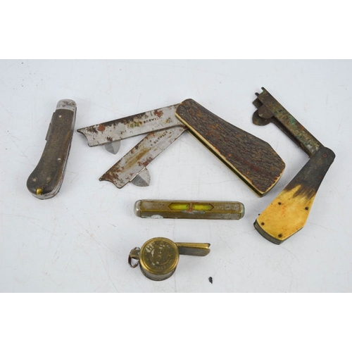 117 - An R. Borwick bloodletting fleam, together with a similar example, an acme whistle, and brass spirit... 