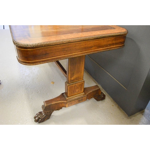 488 - A Regency / William IV inlaid mahogany writing table, in the manner of Gillows 150 by 75 by 74cm.