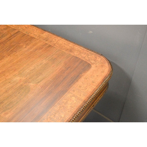 488 - A Regency / William IV inlaid mahogany writing table, in the manner of Gillows 150 by 75 by 74cm.