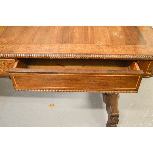 488 - A Regency / William IV inlaid mahogany writing table, in the manner of Gillows 150 by 75 by 74cm.