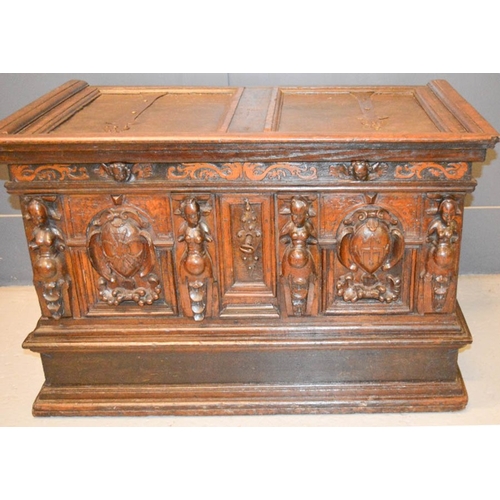489 - A late 16th century oak and walnut marriage chest, painted with pregnant women, and catholic motifs,... 