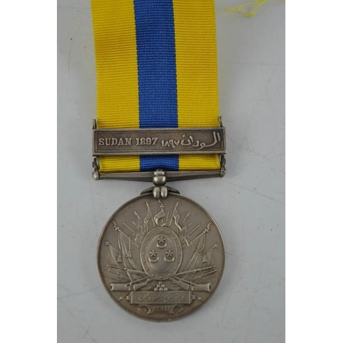 14 - A Sudan medal and clasp, 1897.