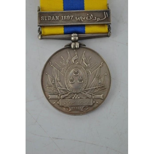 14 - A Sudan medal and clasp, 1897.