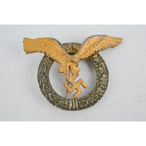 22 - An early Nazi pilots badge with two rivets, bearing makers mark.