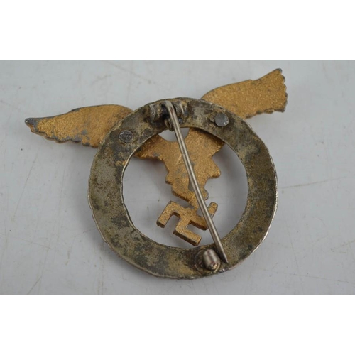 22 - An early Nazi pilots badge with two rivets, bearing makers mark.