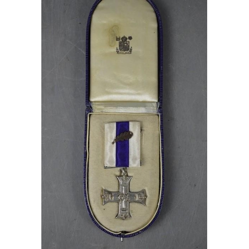 311 - A military cross, unnamed, dated 1941, ribbon bar and box.