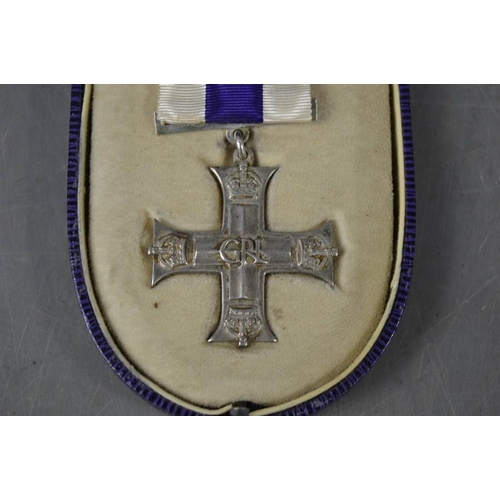 311 - A military cross, unnamed, dated 1941, ribbon bar and box.