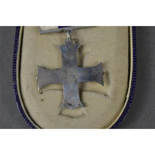 311 - A military cross, unnamed, dated 1941, ribbon bar and box.