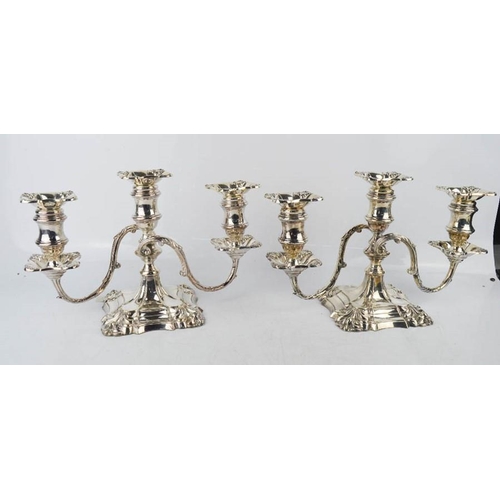 45 - A pair of silver candelabra by William Hutton & Sons Ltd, Sheffield 1960, with removable candle sock... 