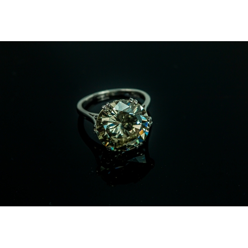 54 - A platinum diamond solitaire ring, the brilliant cut 9.35ct diamond in a six double claw setting, 6.... 