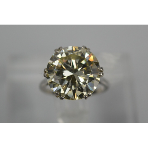 54 - A platinum diamond solitaire ring, the brilliant cut 9.35ct diamond in a six double claw setting, 6.... 