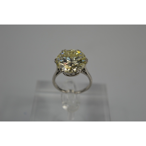 54 - A platinum diamond solitaire ring, the brilliant cut 9.35ct diamond in a six double claw setting, 6.... 