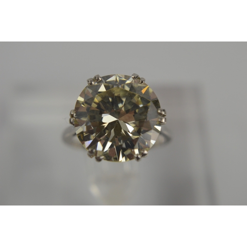 54 - A platinum diamond solitaire ring, the brilliant cut 9.35ct diamond in a six double claw setting, 6.... 