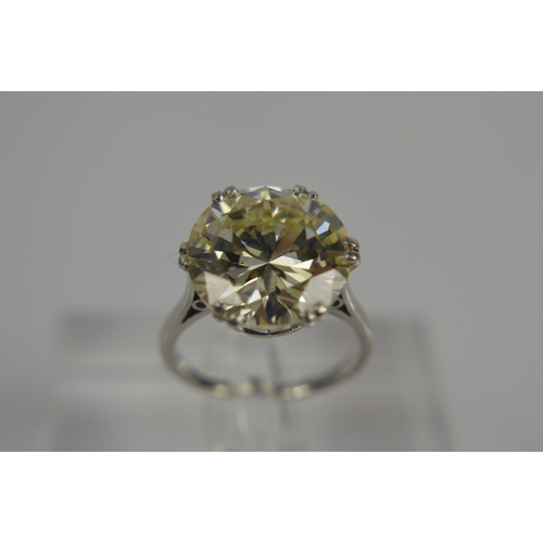 54 - A platinum diamond solitaire ring, the brilliant cut 9.35ct diamond in a six double claw setting, 6.... 