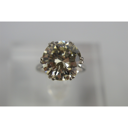 54 - A platinum diamond solitaire ring, the brilliant cut 9.35ct diamond in a six double claw setting, 6.... 