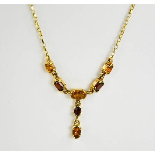 108 - A 9ct gold, citrine and garnet necklace, 4.4g.