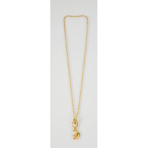 115 - A 9ct gold necklace with crescent moon and cherub pendant, 3.4g.