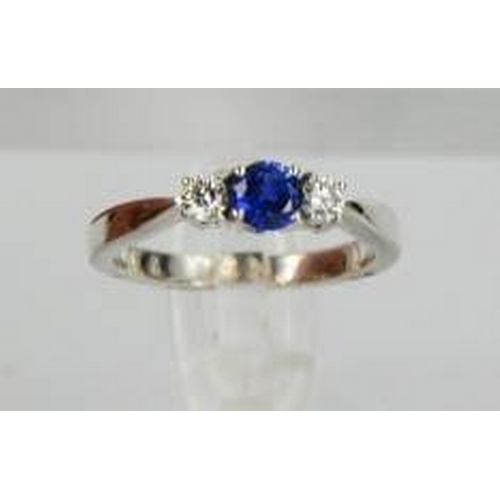 71 - An 18ct white gold, sapphire and diamond trilogy ring, size M, 4.4g.