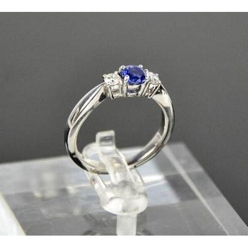 71 - An 18ct white gold, sapphire and diamond trilogy ring, size M, 4.4g.
