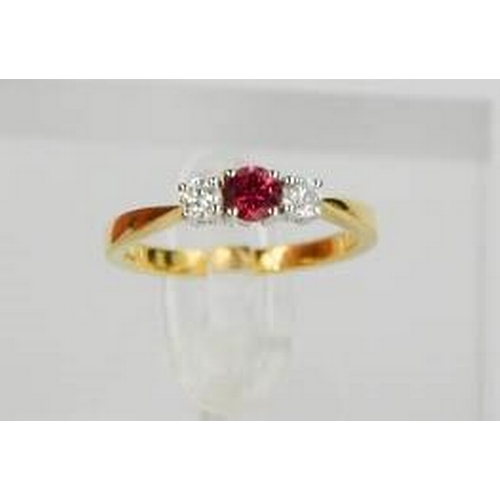 73 - An 18ct yellow gold, diamond and garnet trilogy ring, the central garnet flanked by diamonds, size M... 