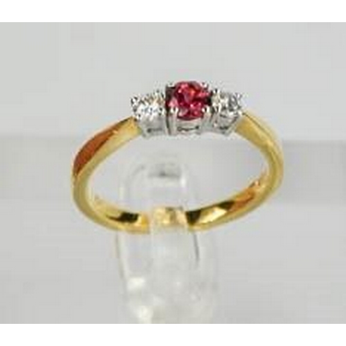 73 - An 18ct yellow gold, diamond and garnet trilogy ring, the central garnet flanked by diamonds, size M... 