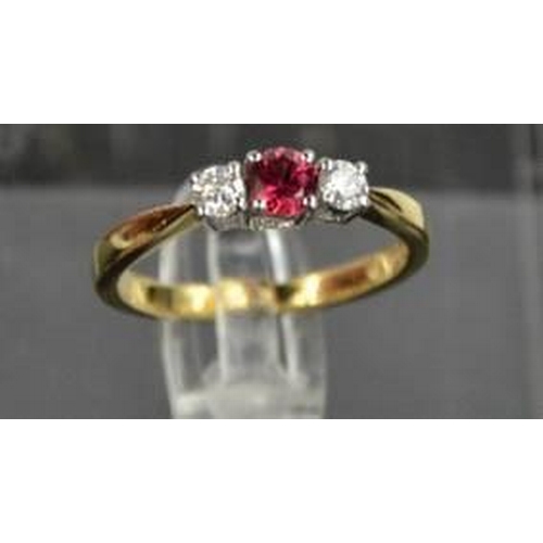 73 - An 18ct yellow gold, diamond and garnet trilogy ring, the central garnet flanked by diamonds, size M... 