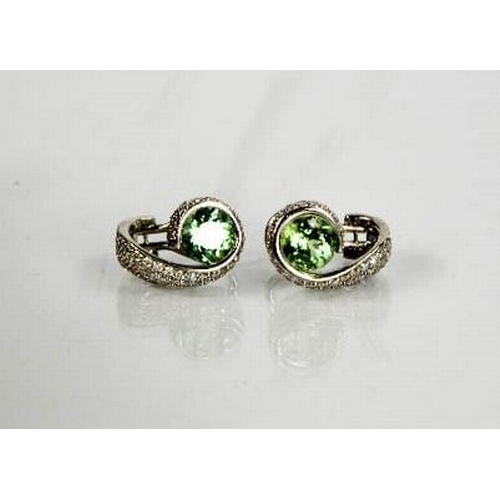 78 - An 18ct green tourmaline and diamond pair of earrings, 10g.