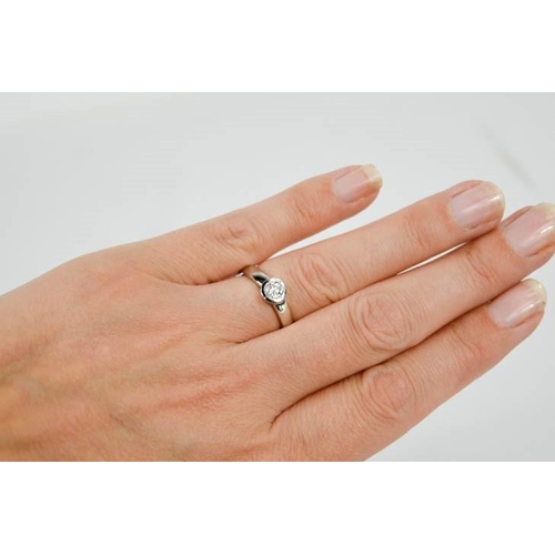92 - A platinum and diamond solitaire ring, the diamond approximately 0.35ct, size L½, 6.2g.