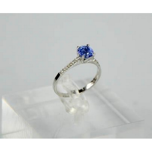 96 - A 14ct white gold, blue sapphire and diamond ring, size M, 1.8g.