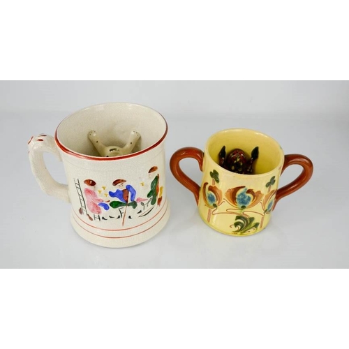 77 - A late 19th century Staffordshire frog mug, and an example by Lauder Barum.
