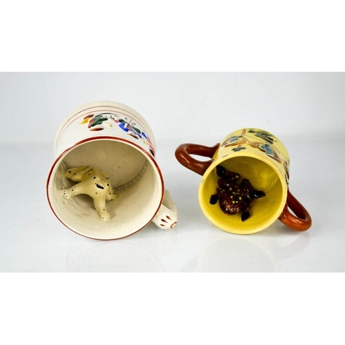 77 - A late 19th century Staffordshire frog mug, and an example by Lauder Barum.