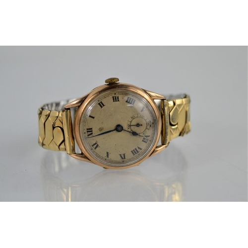 A 9ct Gold watch marked Breguet HSPG