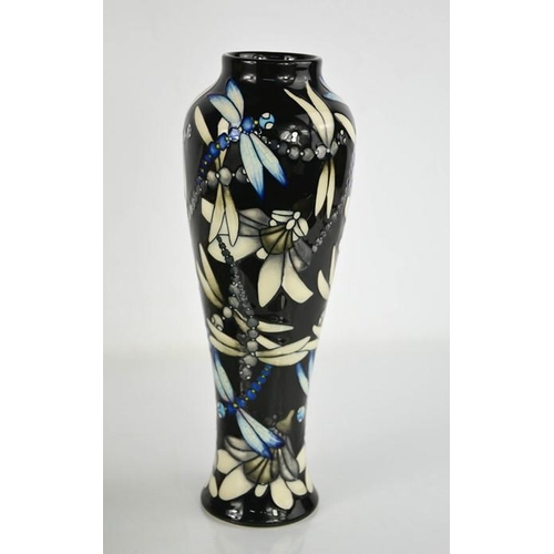 10 - A Moorcroft limited edition vase, in the Dragonfly pattern, of slender baluster form having stylised... 