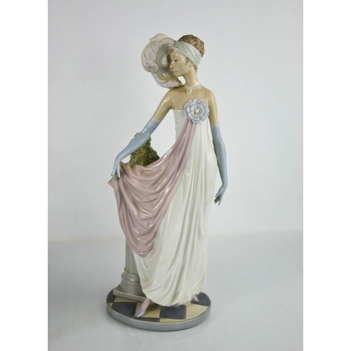 101 - A Lladro figurine titled Socialite of the 1920s, Art Deco style lady, 34cm high.