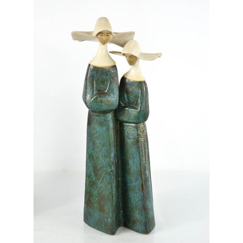 106 - A Lladro porcelain pair of nuns, number 2075, 33cm high.